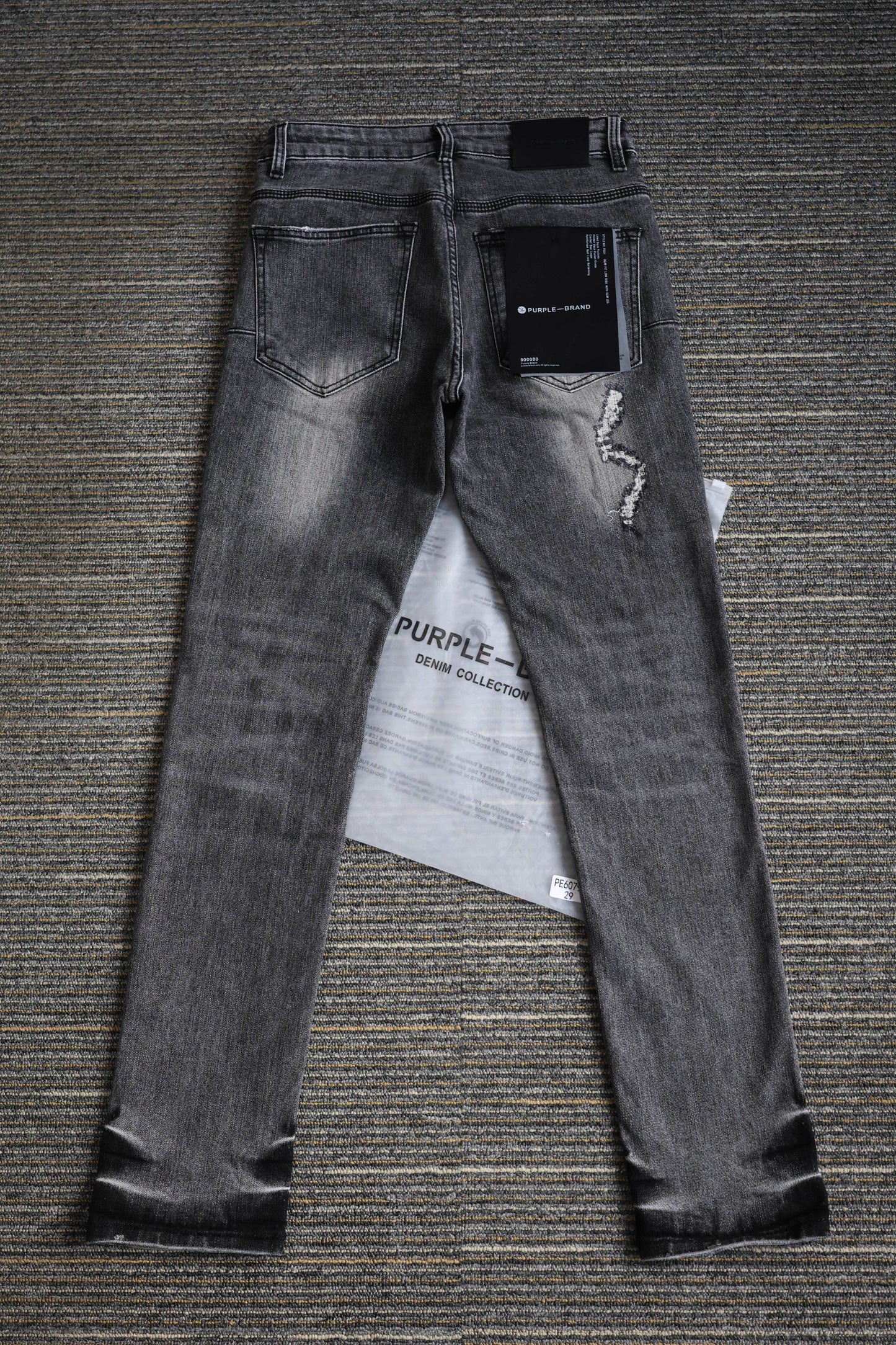 TEXTURED ARCH DENIM “Oil Spill Hem”