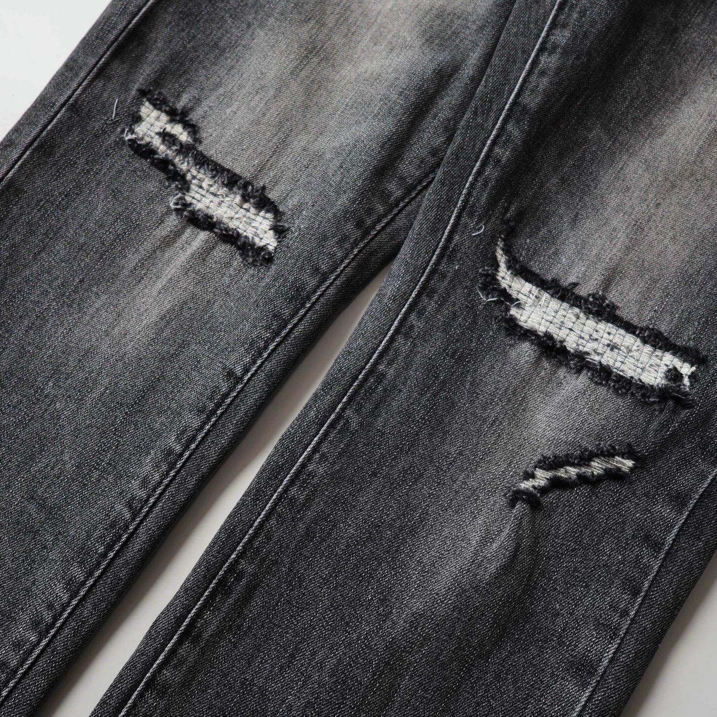 TEXTURED ARCH DENIM “Oil Spill Hem”