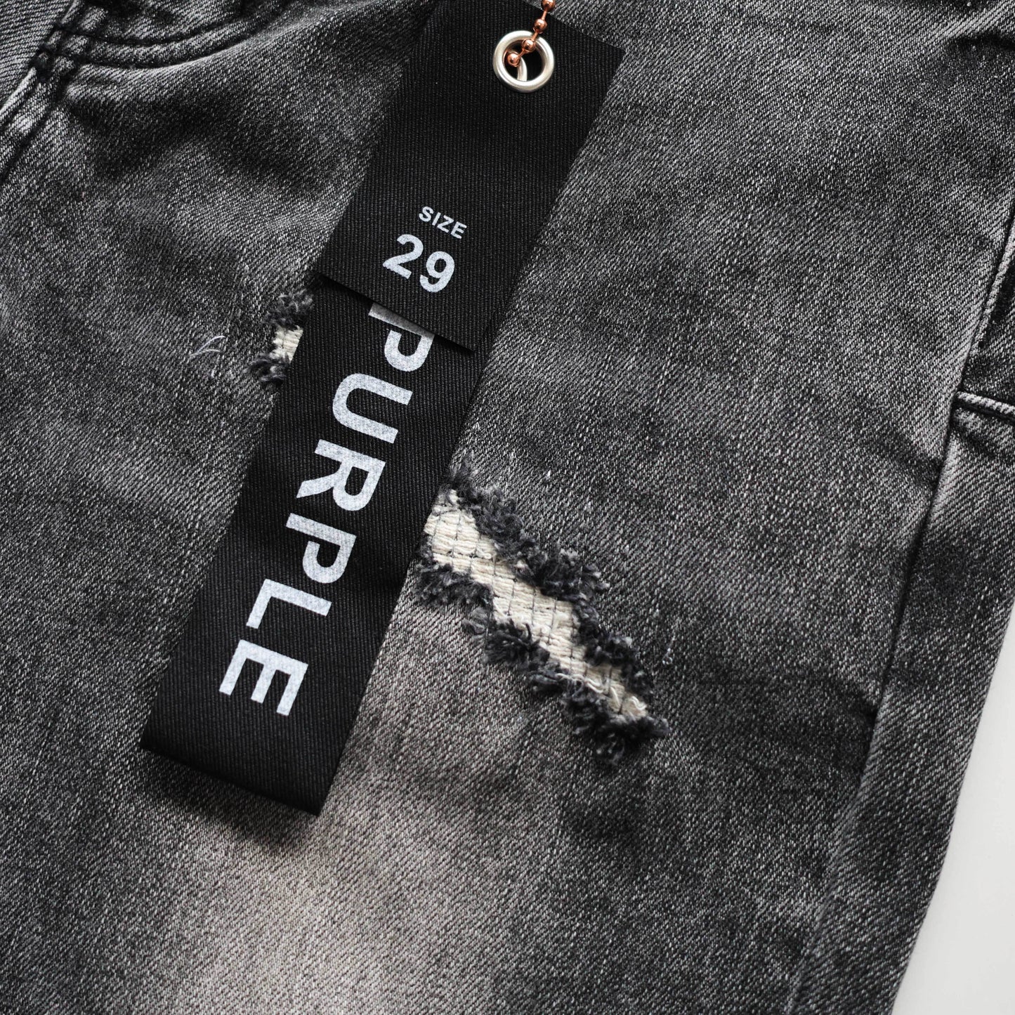 TEXTURED ARCH DENIM “Oil Spill Hem”