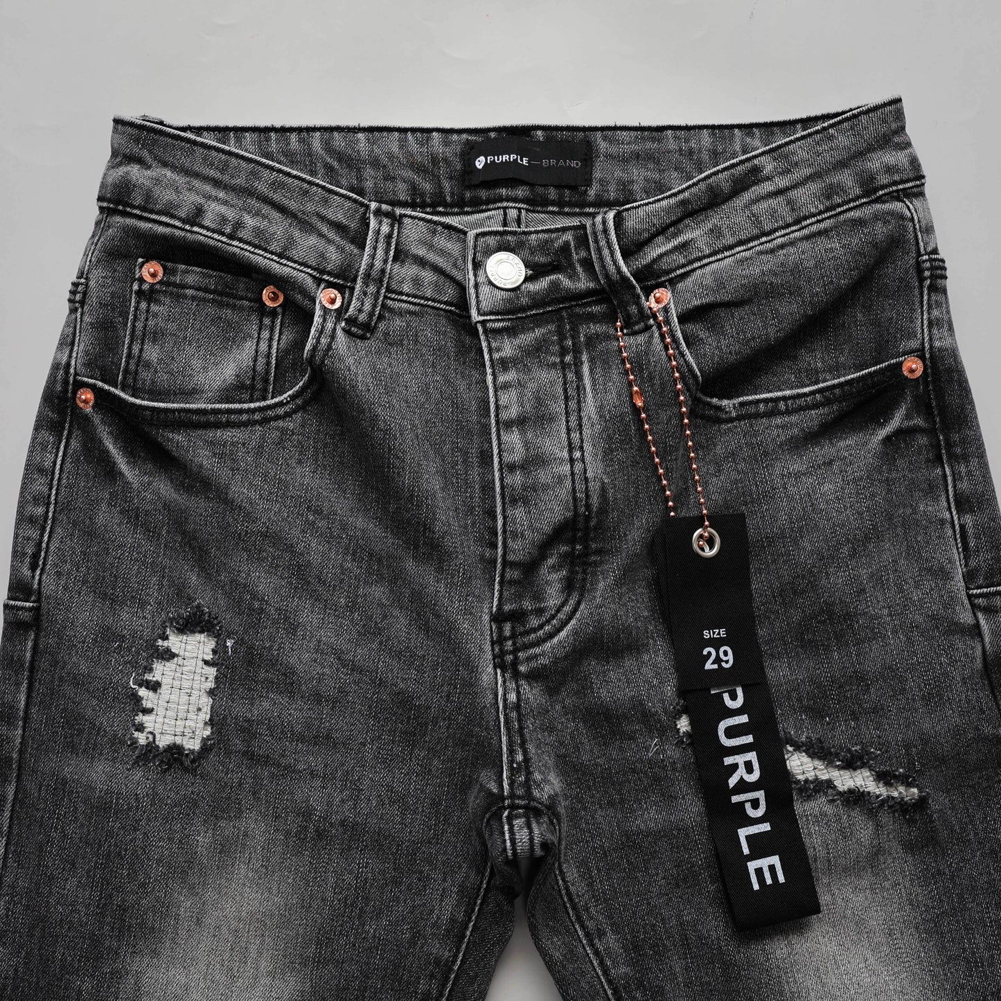 TEXTURED ARCH DENIM “Oil Spill Hem”