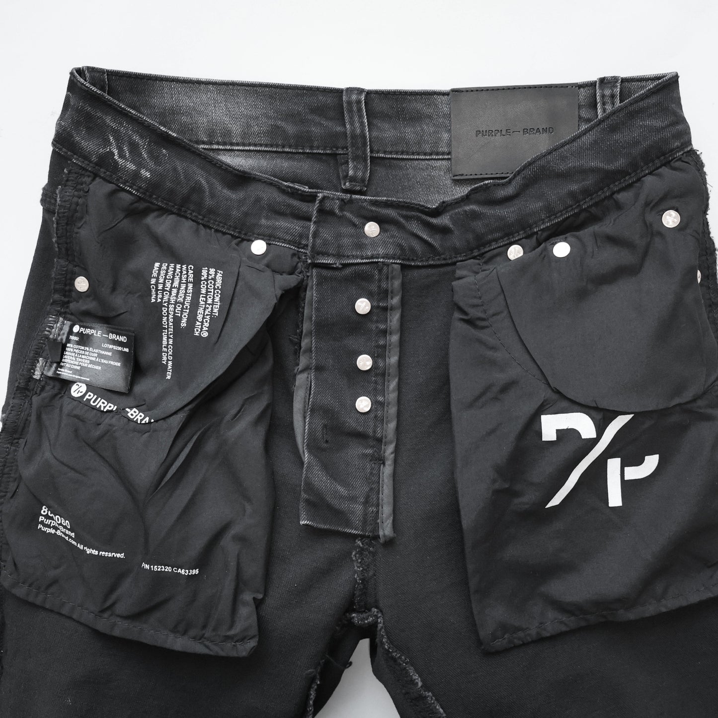 TEXTURED ARCH DENIM “Oil Spill Hem”