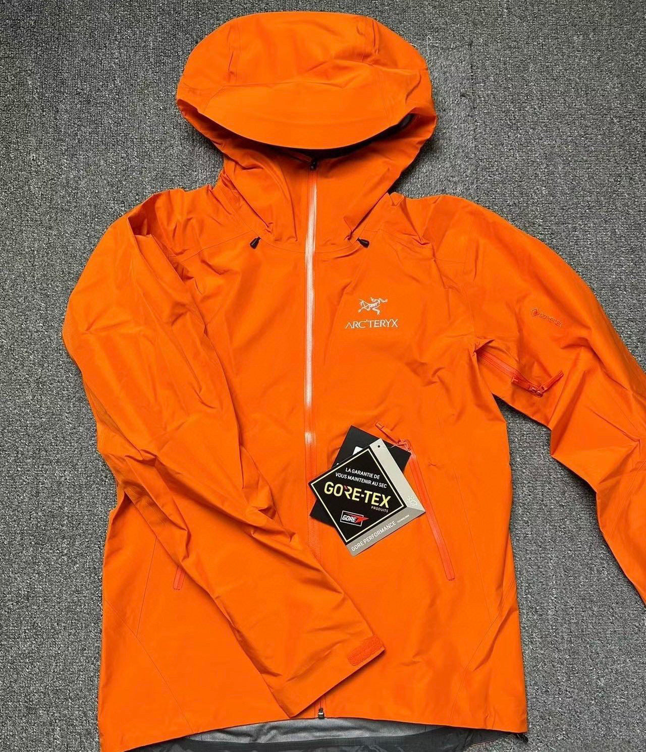 CLIMBERS WINDSHELL “Phenom Orange”