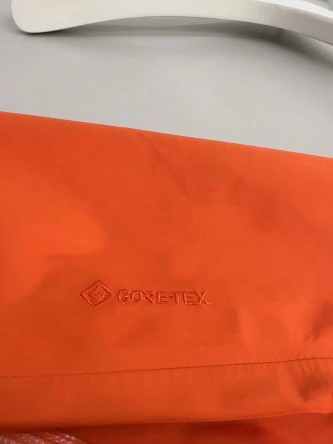 CLIMBERS WINDSHELL “Phenom Orange”