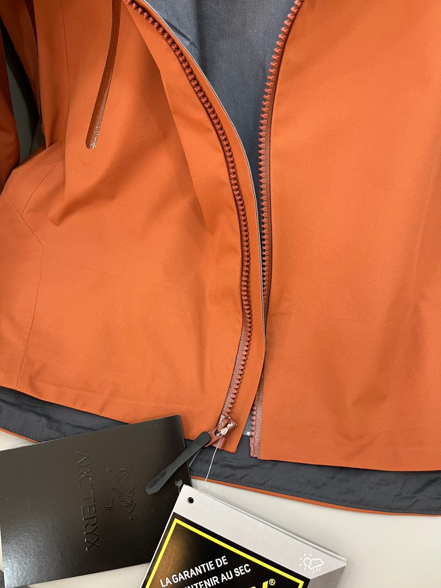 CLIMBERS WINDSHELL “Solitude Orange”