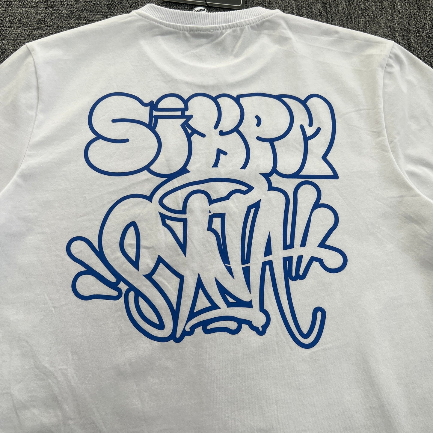 UTILITY GRAPHIC TEE “Can't Rush Greatness White”